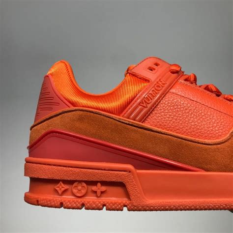 louis vuitton trainers orange mca